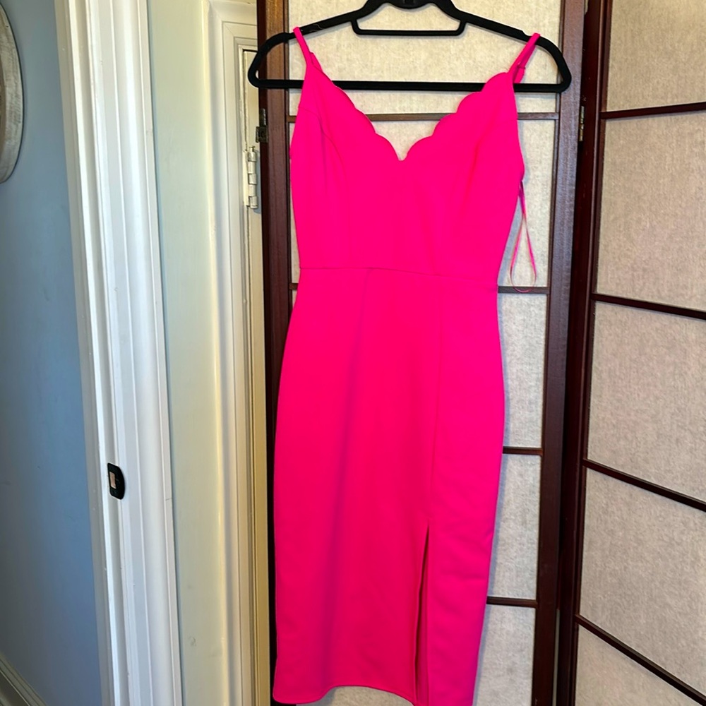 Hot pink scalloped neckline with a straight pencil line midi length dress
